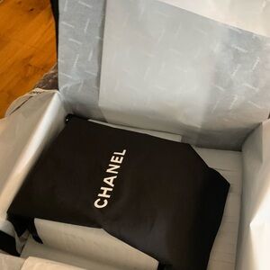 Brand new large authentic Chanel dust bag with string,never been used.Rare size!